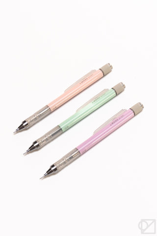 Three mechanical pencils in pink, green, and lavender on a white background