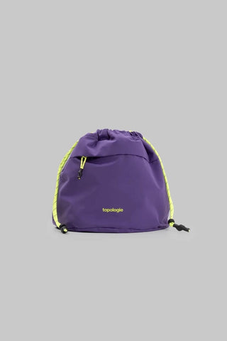Purple drawstring bag with yellow accents on a gray background
