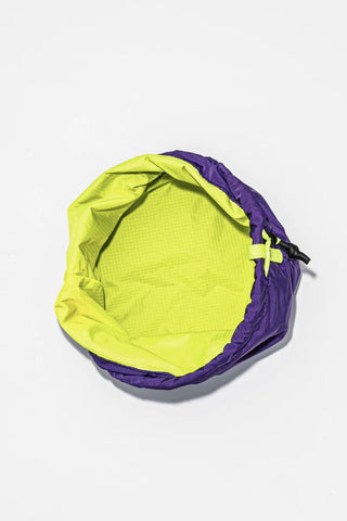 Yellow and purple bucket bag on a white background