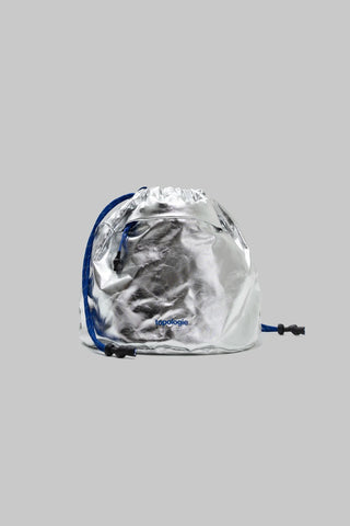 Shiny metallic drawstring bag with blue accents on a gray background