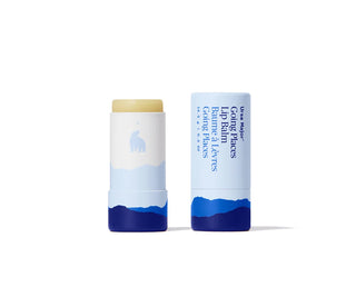 Two lip balms with blue and white packaging on a white background
