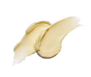 Pale-yellow body butter swatch on spoon, thick creamy texture