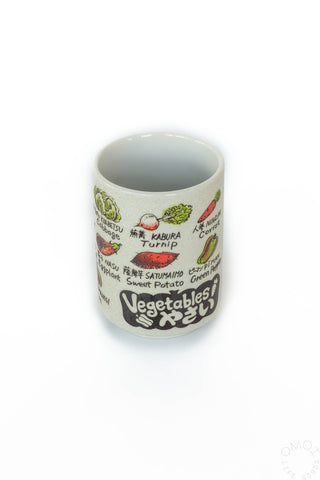 Mug with illustrations of vegetables on a white background