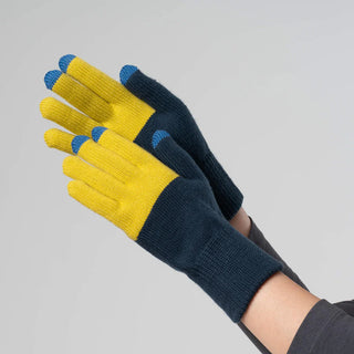 Pair of navy and yellow gloves with blue tips on a gray background