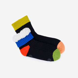 Colorful sock with a colorblock design on a light gray background