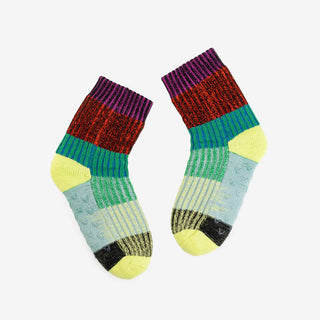 Pair of colorful striped socks on a white background