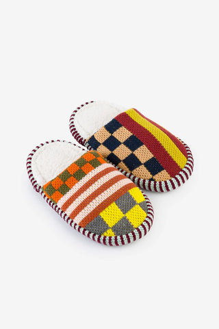 Pair of colorful checkered slippers on a white background