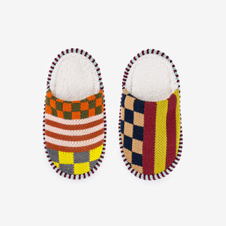 Pair of colorful checkered slippers on a white background