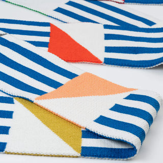 Colorful striped scarf with geometric patterns on a white background