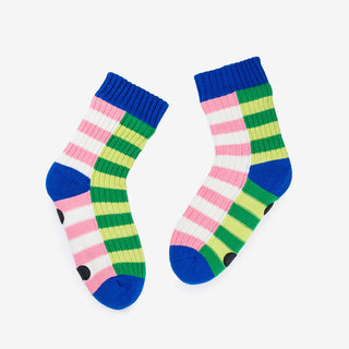 Colorful striped socks with blue, green, pink, and white on a light gray background