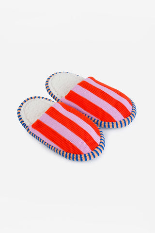Pair of striped slippers on a white background