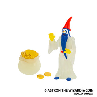Toy figure of a wizard with a red hat and blue beard next to a bag of gold coins on a white background.