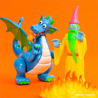 Colorful dragon and wizard figurines on an orange background