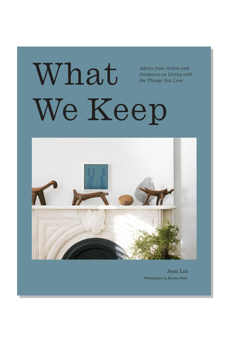 Book cover of 'What We Keep' with a photo of a room interior on a blue background