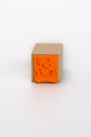 Backside of rubber stamp with bunny design