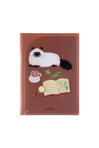 Brown file folder featuring a whimsical illustration of a fluffy white cat alongside a cup of coffee, green leaves, an open book, and a magnifying glass