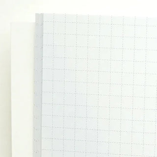 White grid pattern notebook on a white background