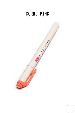 White marker with coral pink cap and body on a white background