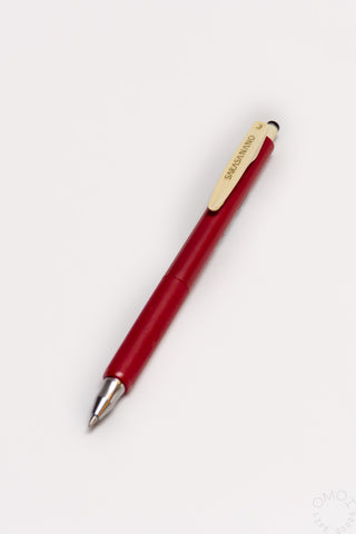 Red pen on a white background