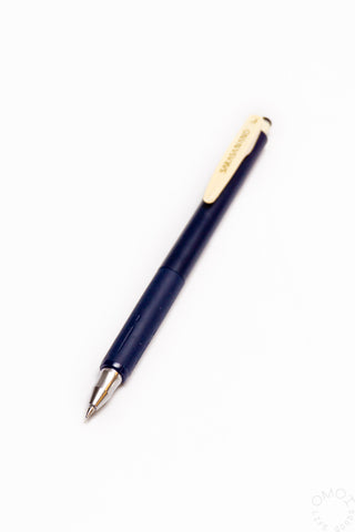 Navy blue pen on a white background