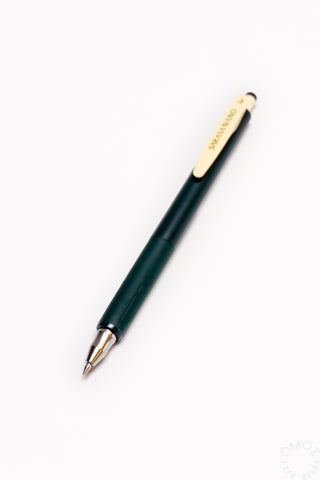 Green pen on a white background