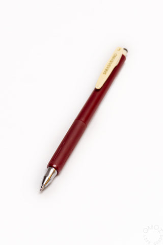 Red pen on a white background