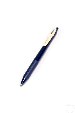 Dark Blue pen with a white clip on a white background