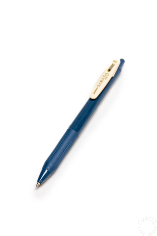 Blue pen with a white clip on a white background