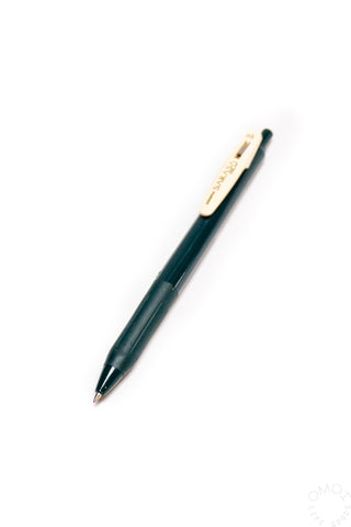 Dark Green pen with white clip on a white background