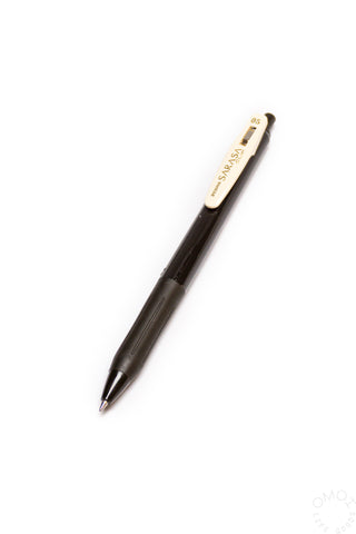 Black pen with white clip on a white background