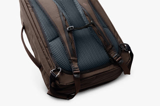 Brown backpack with back mesh panel on a white background