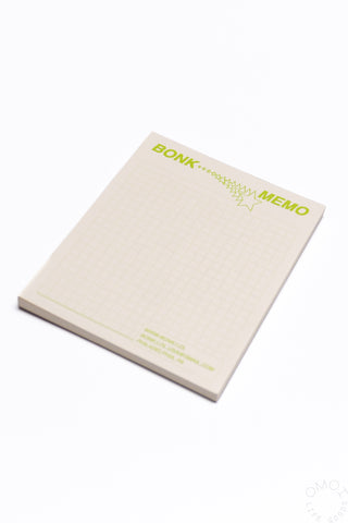 Green memo pad with 'BONK' and 'MEMO' text on a white background