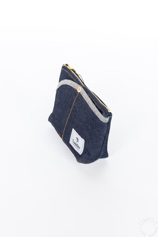 Side view of small denim Luddite pouch on a white background