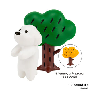 White dog figurine with a green tree on a white background