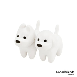 Two white dog figurines with black accents on a white background, labeled 'Good friends' by Matsui.