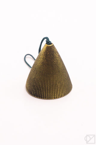 Gold cone-shaped wind chime on a white background