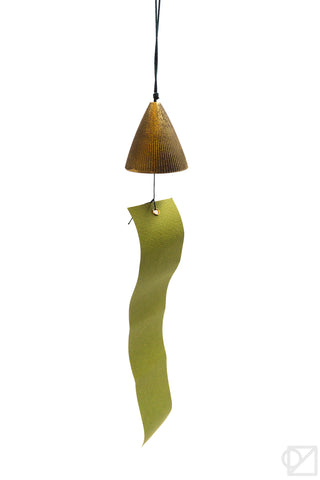 Decorative wind chime hanging with green paper on a white background
