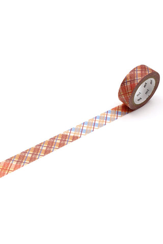 Colorful plaid pattern washi tape rolled out on a white background