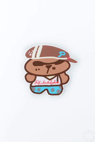 Cartoon bear character wearing a cap and shirt with text on a white background