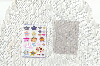 Set of Filler Arc stickers on a textured white lace surface