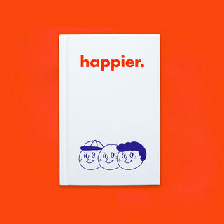 White notebook with 'happier.' text and cartoon faces on an orange background