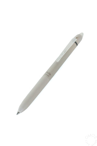 Erasable gel pen with white barrel and fine point, tilted view
