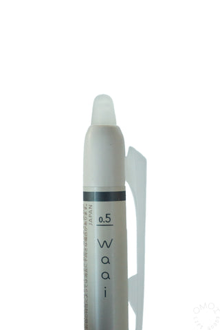 Erasable gel pen with 0.5 label on barrel, white body