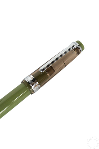 Close up of Sailor chestnut fountain pen cap on a white background