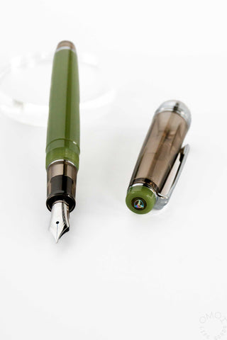 Sailor green fountain pen with cap in chestnut on a white background