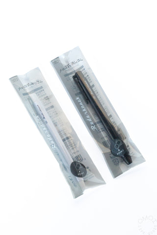 Two packages of mechanical eraser refills, white and black