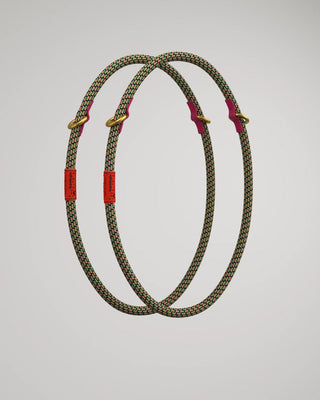 Colorful loop ropes with red and gold accents on a light gray background