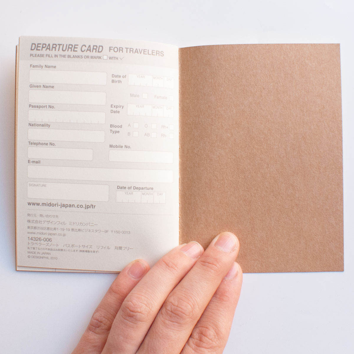 TRAVELER'S COMPANY Passport 006 Open Dated Monthly Planner – Omoi Life Goods traveler-s-company-passport-006-open-dated-monthly-planner-omoi-life-goods