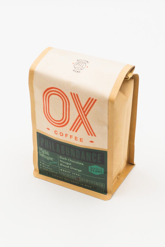 Whole bean coffee blend bag with OX logo, Philabundance green label